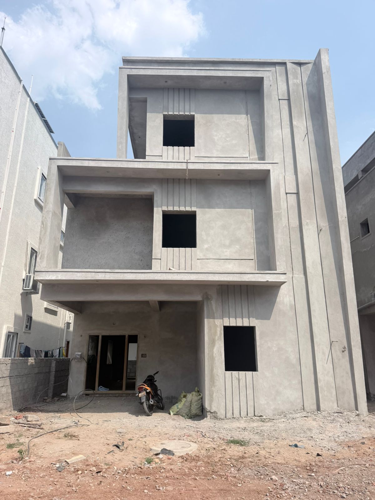 Indus Homes construction-stage villa façade